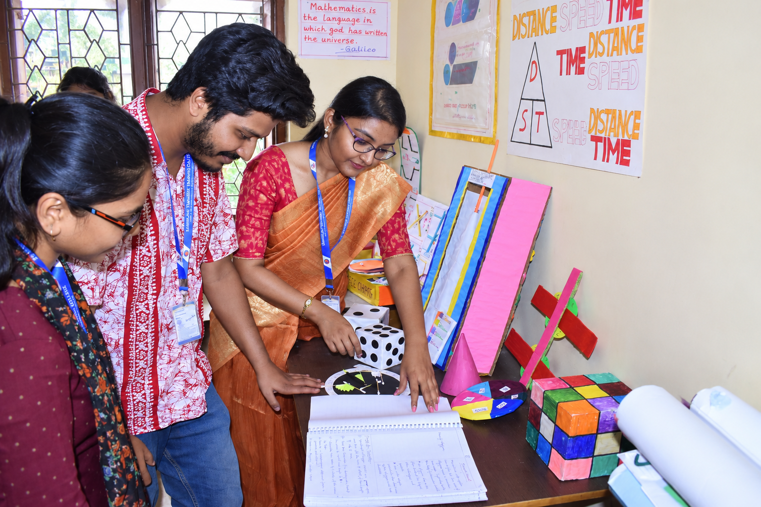 Teacher guiding students during classroom learning